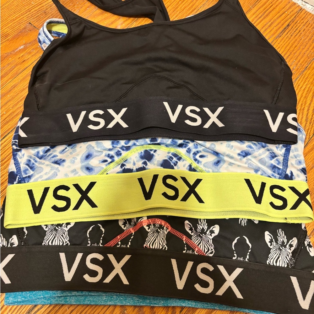 VSX Sports Bras in Black, Blue, and Yellow